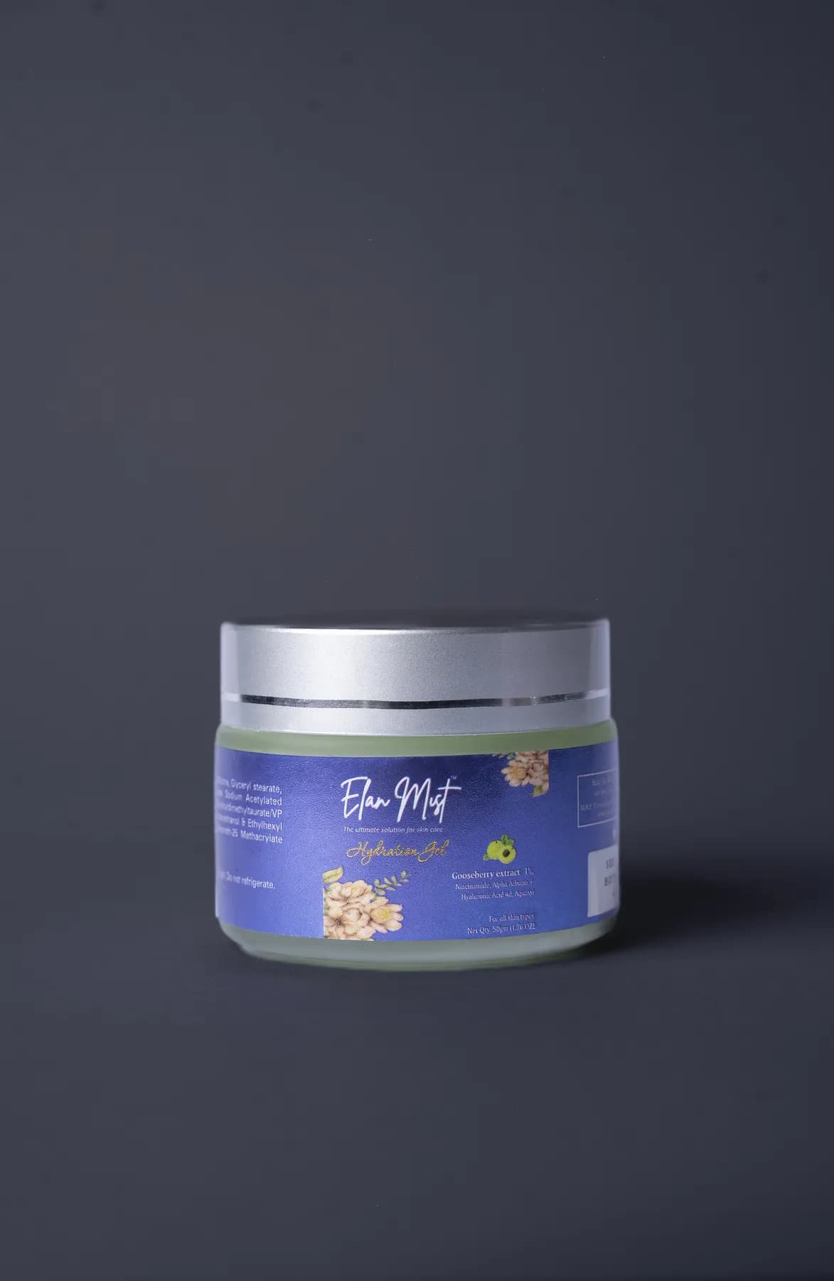 Elanmist HydroBoost Gel jar with a silver lid on a slate-grey backdrop